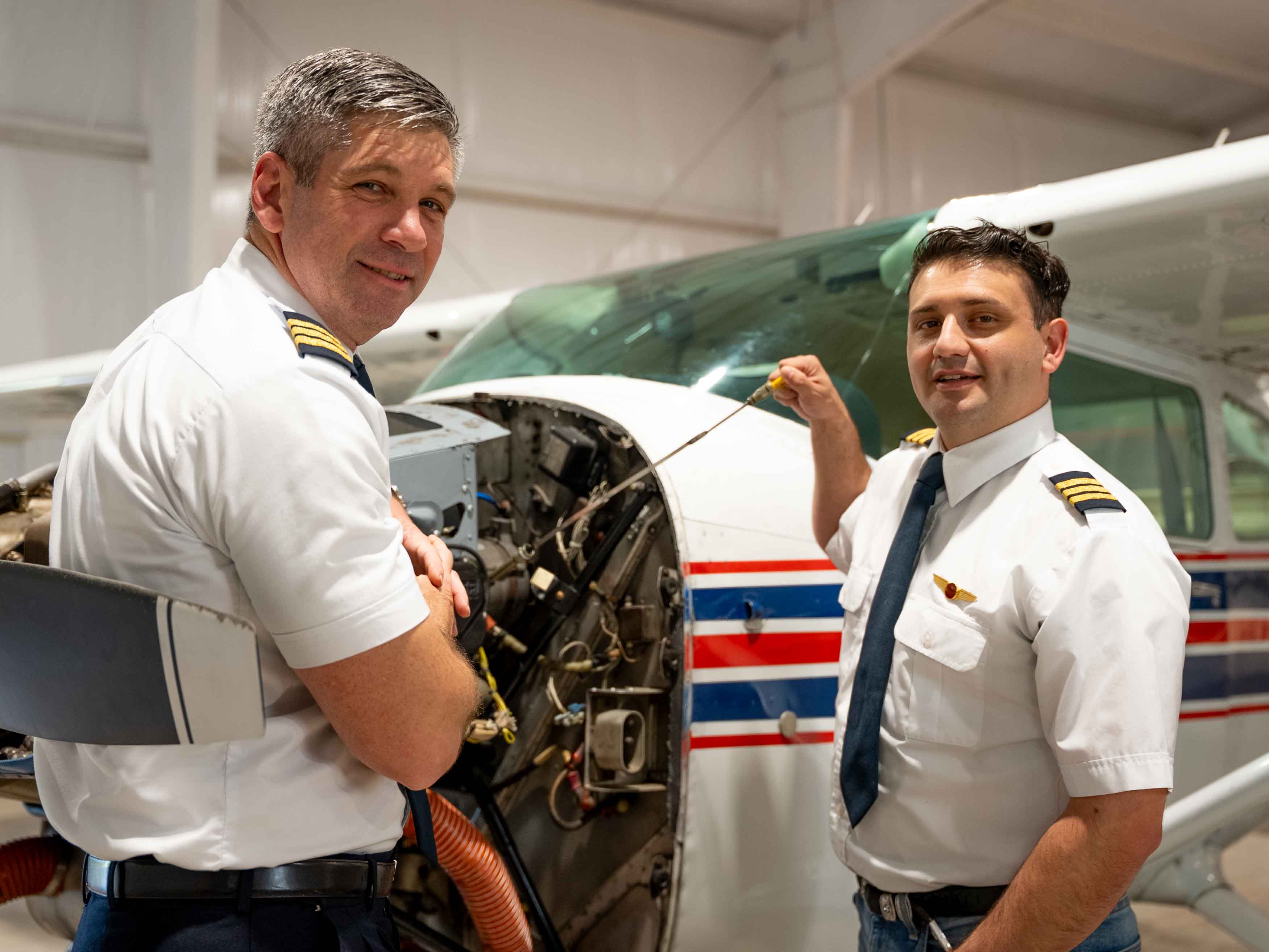 APM Paint founders Bill Boehm and Chris Fitch in the hangar