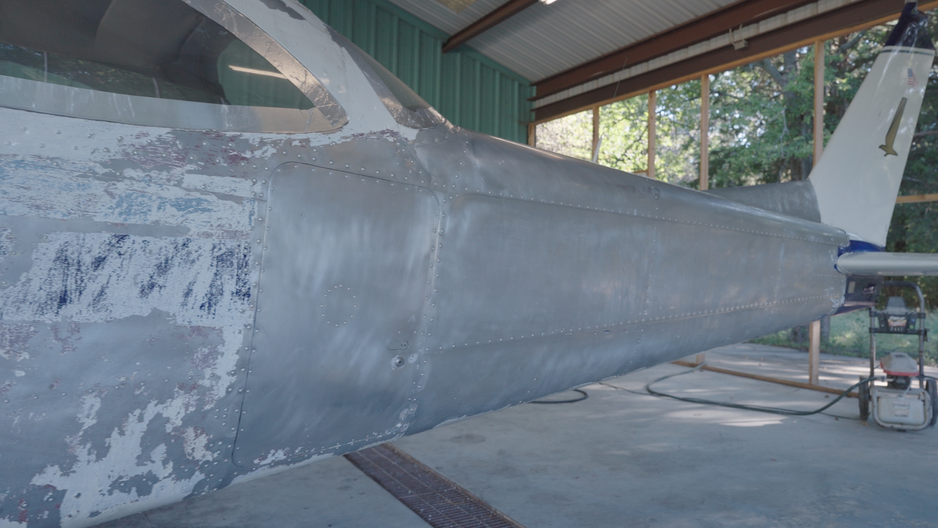 N35715 stripped — tail section, bare aluminum