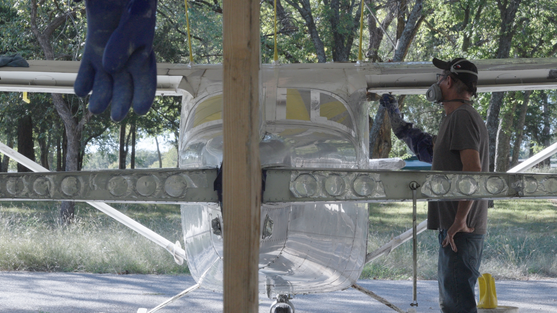 APM Paint lead painter applying finish coat to N35715