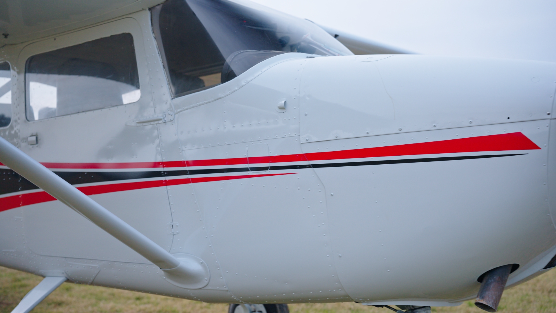 N35715 — custom red and black stripe detail on finished aircraft